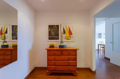 a room with a dresser and a dresser with sails on it at OCEANO Family Home free parking by Cadiz4Rentals in Cádiz