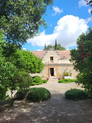 a large stone building with a roof at Casa Viña de Alcántara in Jerez de la Frontera