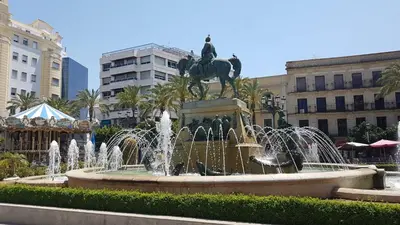 a statue of a man on a horse in a fountain at Sherryflat Fate in Jerez de la Frontera