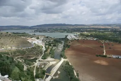 an aerial view of a river and a city at Bed & Breakfast Casa El Sueño in Arcos de la Frontera