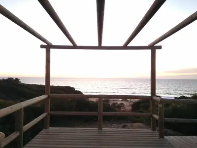 a view of the ocean from a gazebo at Chalet en Roche in Conil de la Frontera