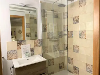 a bathroom with a sink and a shower at No 14 Cádiz in Cádiz