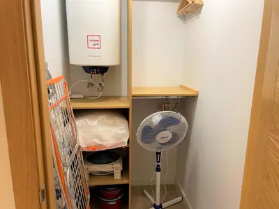 a closet with a fan and a water heater at No 14 Cádiz in Cádiz