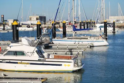 a group of boats docked in a harbor at Hostal Avenida by Bossh! Hotels in Chipiona