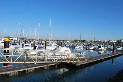 a marina filled with lots of boats in the water at Hostal Avenida by Bossh! Hotels in Chipiona