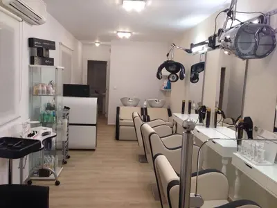a salon with a bunch of chairs in a room at Hotel Antonio Conil in Conil de la Frontera
