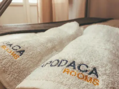a close up of two towels on a table at Apodaca Rooms in Cádiz