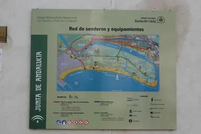 a sign hanging on a wall with a map at La casa De Los Faros in El Puerto de Santa María