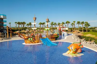 a water park with a slide and a water park at Hotel Best Costa Ballena in Costa Ballena