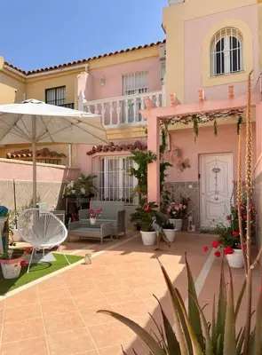 a house with a patio in front of it at Palast Stieg Guest House in Jerez de la Frontera