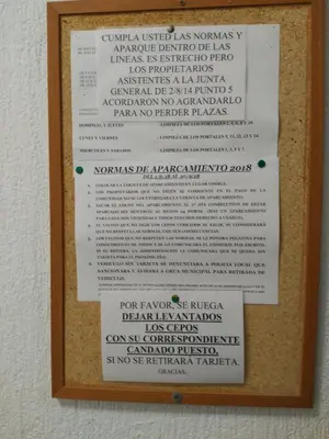a framed picture of a menu on a wall at Frente al mar in Rota