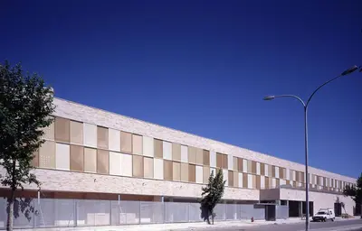 a large building with a street light in front of it at Apartamento en la playa de Valdelagrana in El Puerto de Santa María