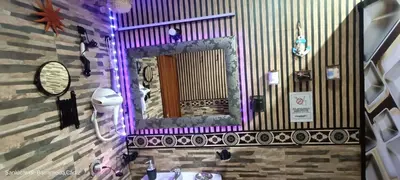a bathroom with a mirror and a sink at La Casita Del Indio in Sanlúcar de Barrameda