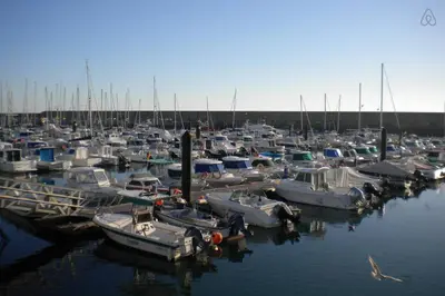 a bunch of boats docked in a harbor at APARTAMENTO VILLA DE ROTA - VISTA MAR, 135m2, Terraza, SAT TV y más in Rota