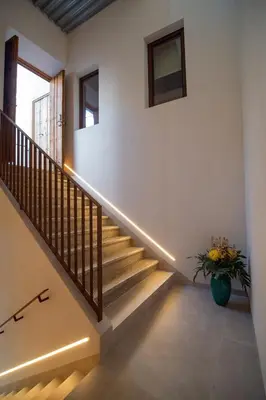 a staircase with led lights in a house at Apartamentos Alcoba 13 in Sanlúcar de Barrameda