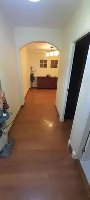 an empty room with a hallway with a wooden floor at Emperador Carlos in San Fernando