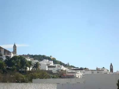 a view of a city from the top of a building at Hotel Restaurante El Duque in Medina Sidonia