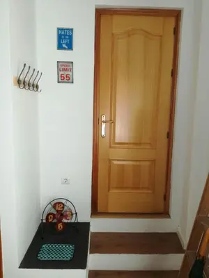 a room with a door and a shelf next to it at Atico SIROCO in Sanlúcar de Barrameda