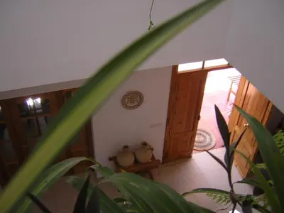 two teddy bears sitting on a table in a room at Casa Algaida in Sanlúcar de Barrameda
