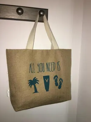 a tote bag with the words all you need is iv at Casa de Corralón in Cádiz