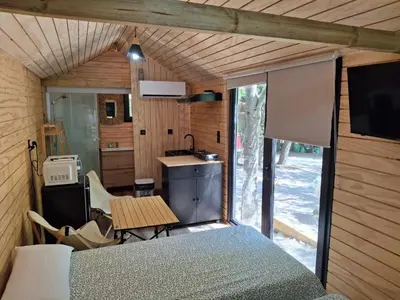 a kitchen with a sink and a counter top at Bungalows y Glamping Medina Sidonia in Medina Sidonia