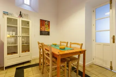 a bedroom with a bed and a window at GuestReady - Arbolí Cadiz in Cádiz