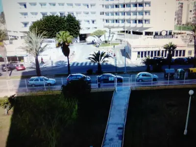 a view of cars parked in a parking lot at VIVIENDA TURISTICA MARANt 2 in El Puerto de Santa María