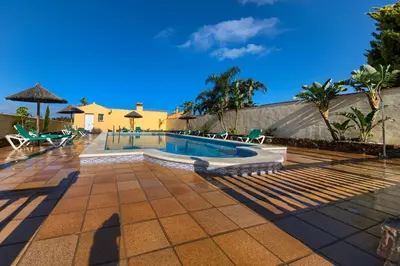 a view of a swimming pool in a resort at Apartamentos Villafaro Conil in Conil de la Frontera