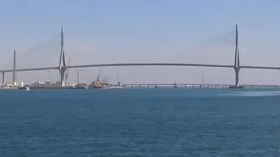 a bridge over a body of water with at Apartamento Santa Faz in El Puerto de Santa María