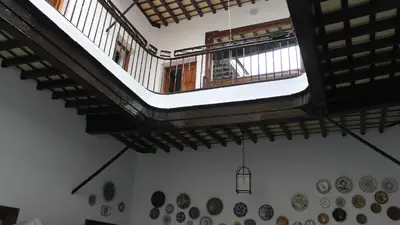 an overhead view of a room with plates on the wall at Hospederia 1881 in Chiclana de la Frontera