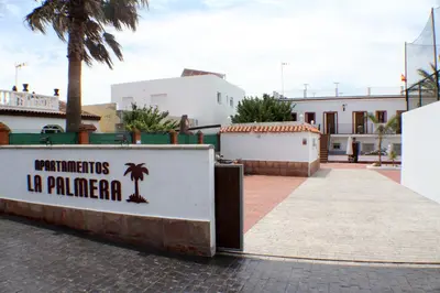 a sign for the villas la palapa at Apartamentos La Palmera in Conil de la Frontera