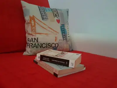 two pizza boxes sitting on a table with a pillow at San Francisco's House in Medina Sidonia