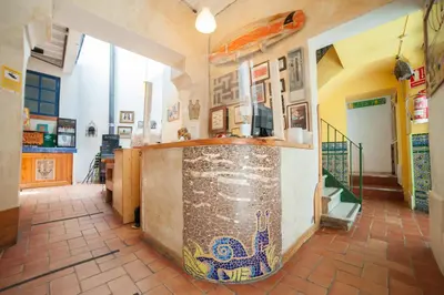 a kitchen with a counter in a room at Casa Caracol in Cádiz