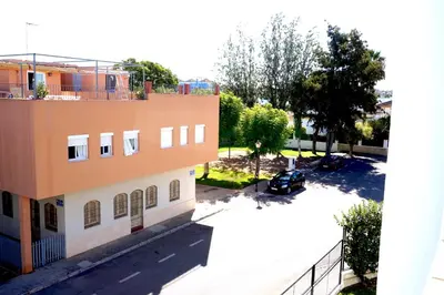 an aerial view of a building with a parking lot at Villa Horacia in Sanlúcar de Barrameda