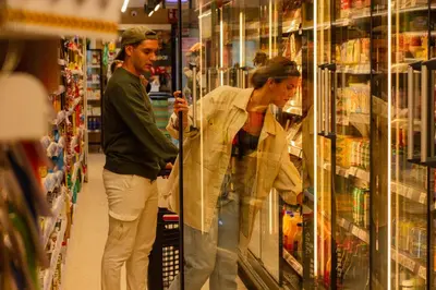 a man and a woman standing in a store aisle at TAIGA Puerto Santa María in El Puerto de Santa María