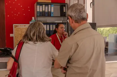 a group of three people standing in a room at TAIGA Puerto Santa María in El Puerto de Santa María