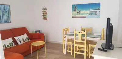 a living room with a couch and a table at Casa del Mar in Puerto Real