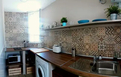 a kitchen with a sink and a counter top at Casa del Mar in Puerto Real