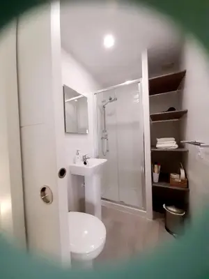 a bathroom with a toilet and a shower and a sink at Estudio Carmen in Cádiz