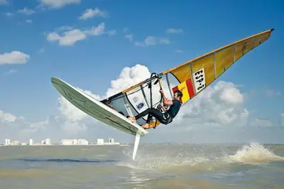 a man riding a wind sail in the water at Piso frente la playa de Valdelagrana in El Puerto de Santa María