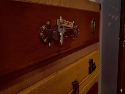 a wooden drawer with a price tag on it at Apartamentos Jerez in Jerez de la Frontera