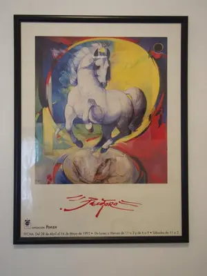 a framed painting of a white horse jumping over at Casa Valientes B - Parking privado gratis & patio interior in Jerez de la Frontera