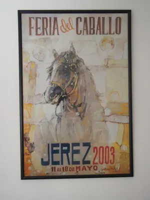 a painting of a horse on a wall at Casa Valientes B - Parking privado gratis & patio interior in Jerez de la Frontera