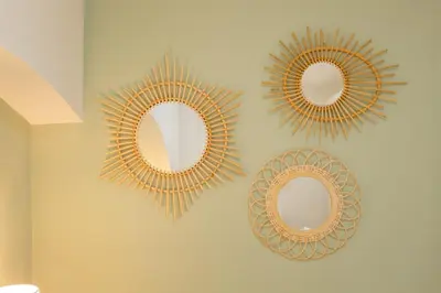 three mirrors hanging on a wall in a room at Nueva ALMUDENA Apartment by Cadiz4Rentals in Cádiz