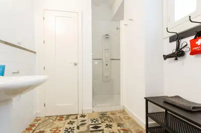a bathroom with a shower and a sink at Tierra & Mar Ascensor Grupo AC Gestion in Cádiz