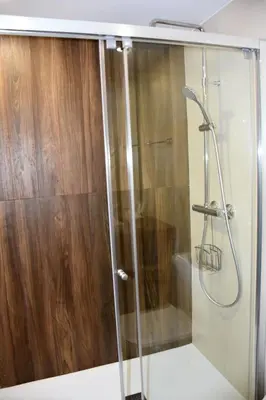 a shower with a glass door in a bathroom at Sweet Velázquez Apto. zona Playa Victoria in Cádiz