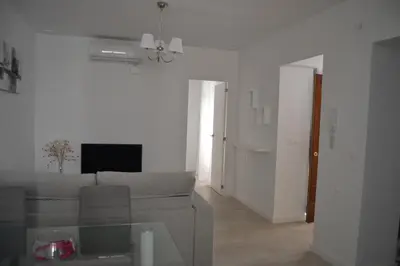 a living room with a couch and a table at Beautiful Central Cadiz in Cádiz