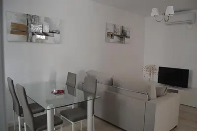 a living room with a couch and a table at Beautiful Central Cadiz in Cádiz