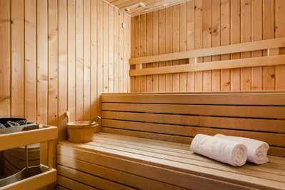a wooden sauna with two rolls of toilet paper in it at Eurostars Asta Regia Jerez in Jerez de la Frontera