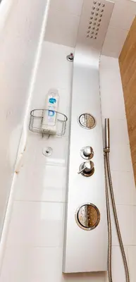 a bathroom with a shower with a shower head at CDZ - Poniente in Cádiz